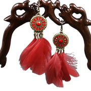 Summer collection : European and American bohemian beach temperament earrings drip sun flower feather tassel earrings